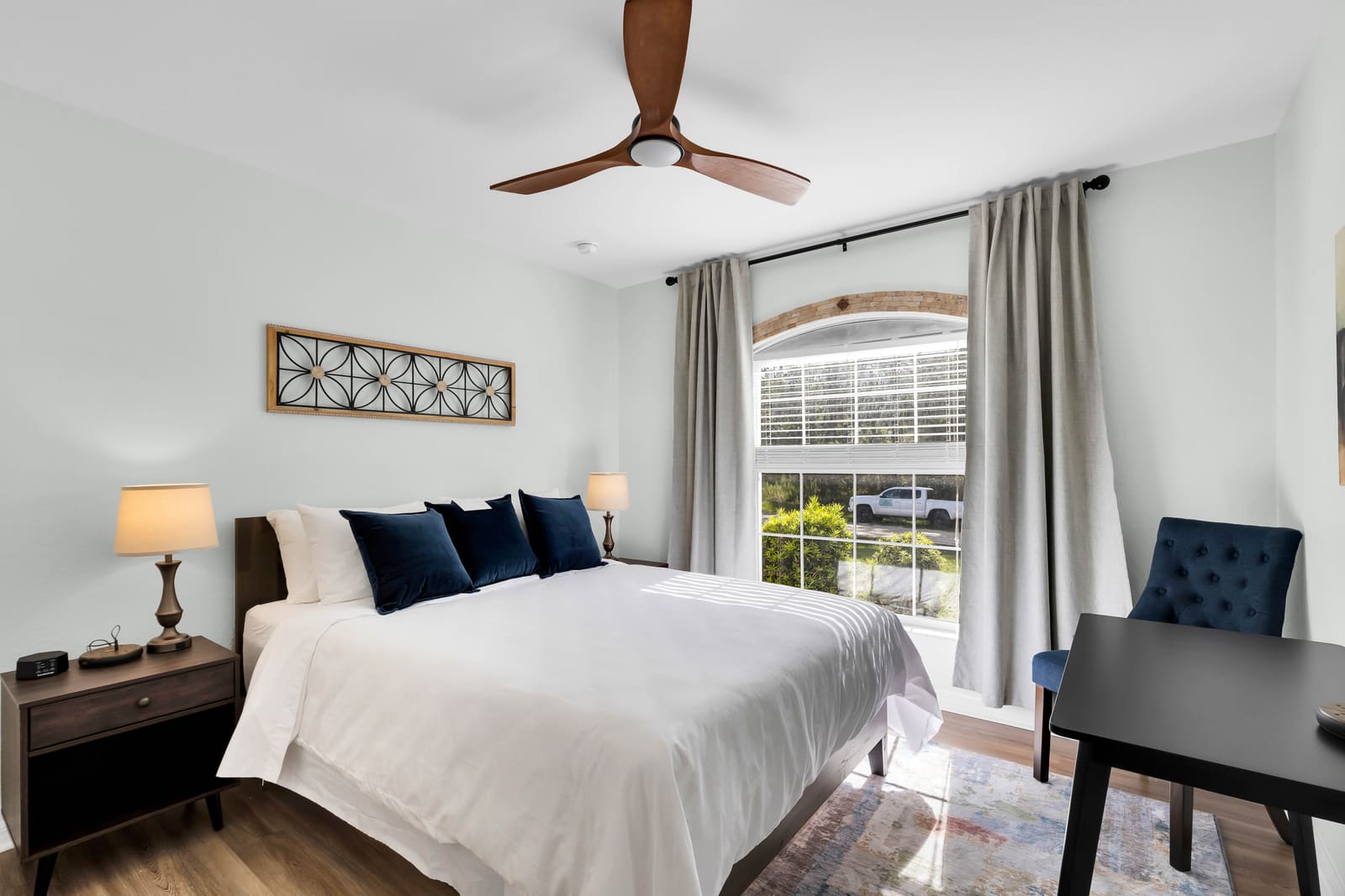 Third bedroom with queen bed and desk