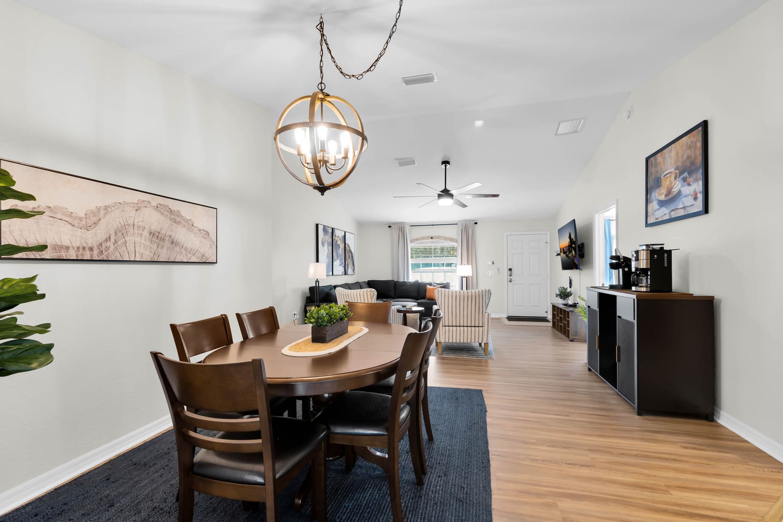 Dining table for six under a pendant light