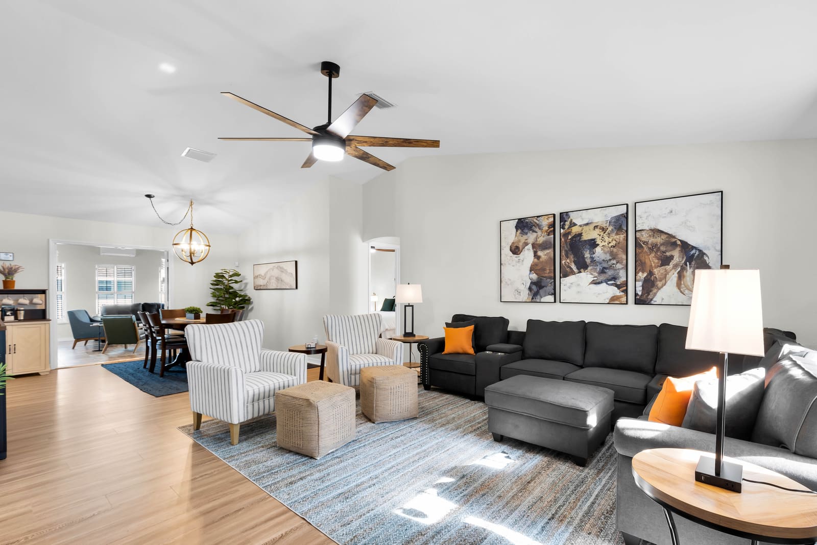 Living room with sectional sofa and ceiling fan
